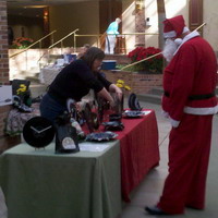 HiFiFollies.com for sale at Sweet Adelines Skyline Chorus Christmas show - working out a contract with Santa